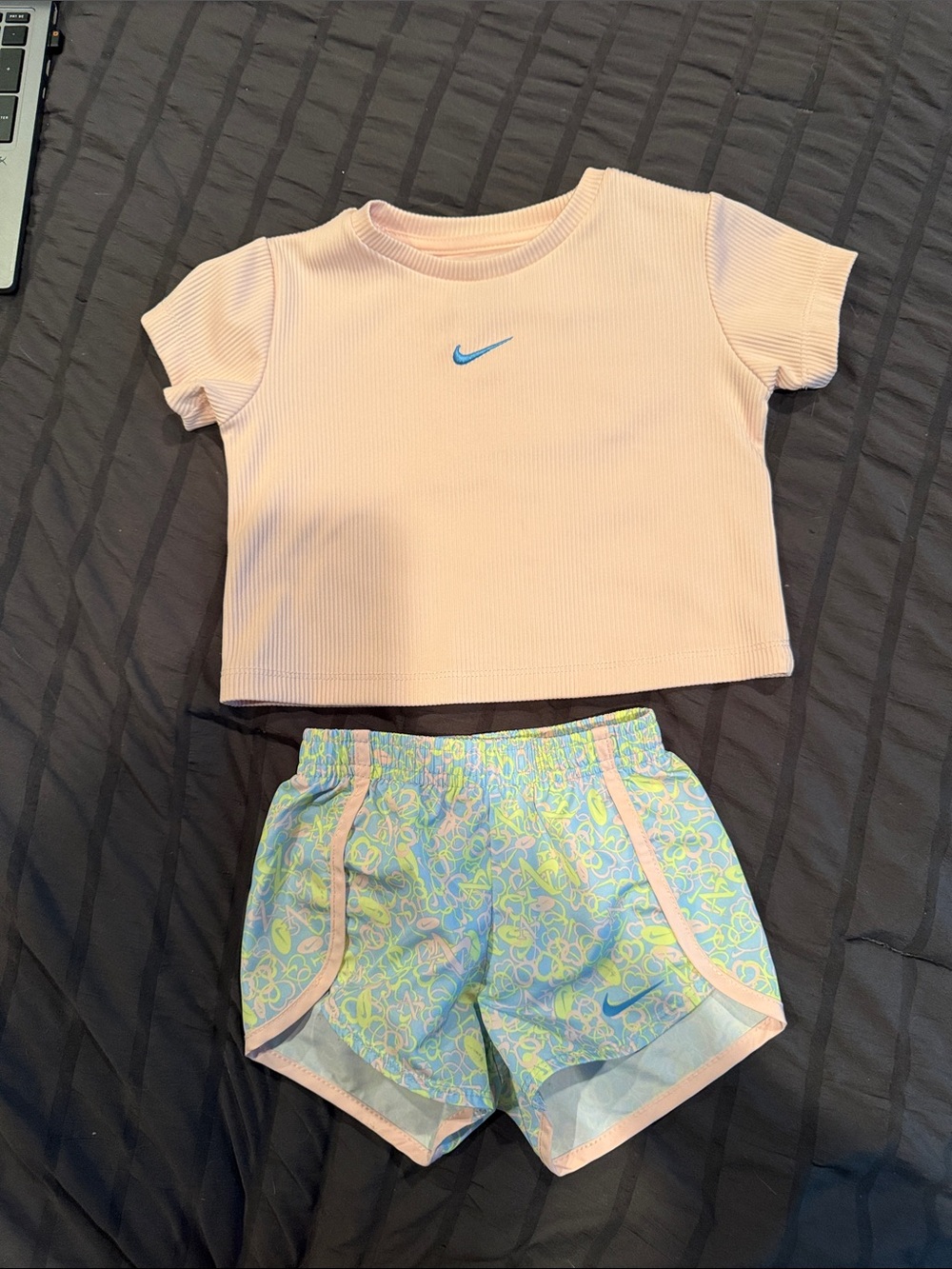 Nike Pastel Pink Ribbed Crop Tee with Blue-Accented Floral Running Shorts - Picture 1 of 4